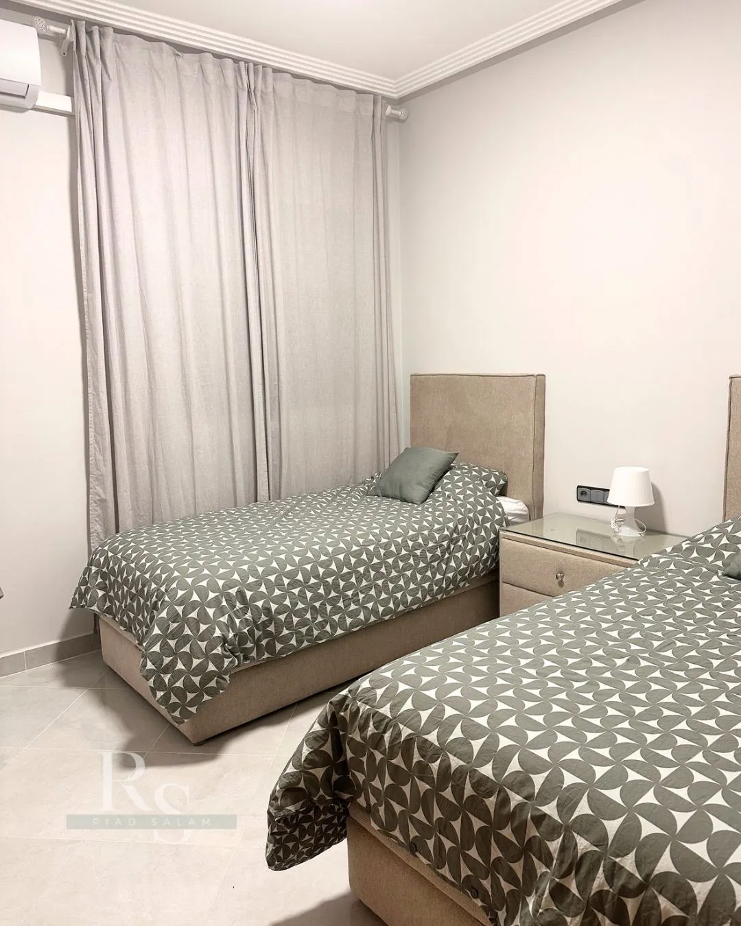 Bedroom with natural light and city view